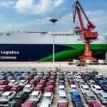 Vehicles waiting for overseas shipment at a China auto export yard in 2026